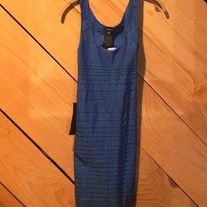 Blue fitted dress that falls above knee